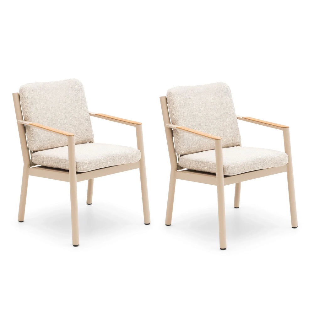 Pair of beige fabric dining chairs with metal frames and cushioned seats