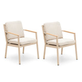 Pair of beige fabric dining chairs with metal frames and cushioned seats