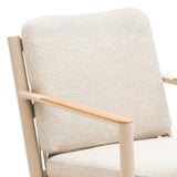 Beige fabric armchair with cushioned backrest and light wood armrest detail