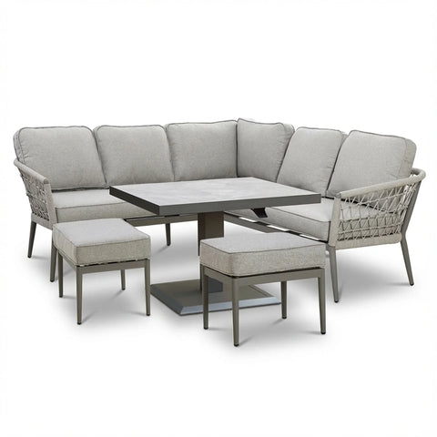 Grey outdoor corner sofa set with cushions, square dining table and two matching stools