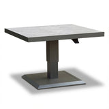 Square grey modern dining table with metal pedestal base on white background