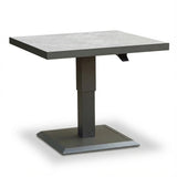 Square height adjustable dining table with stone-effect top and metal base