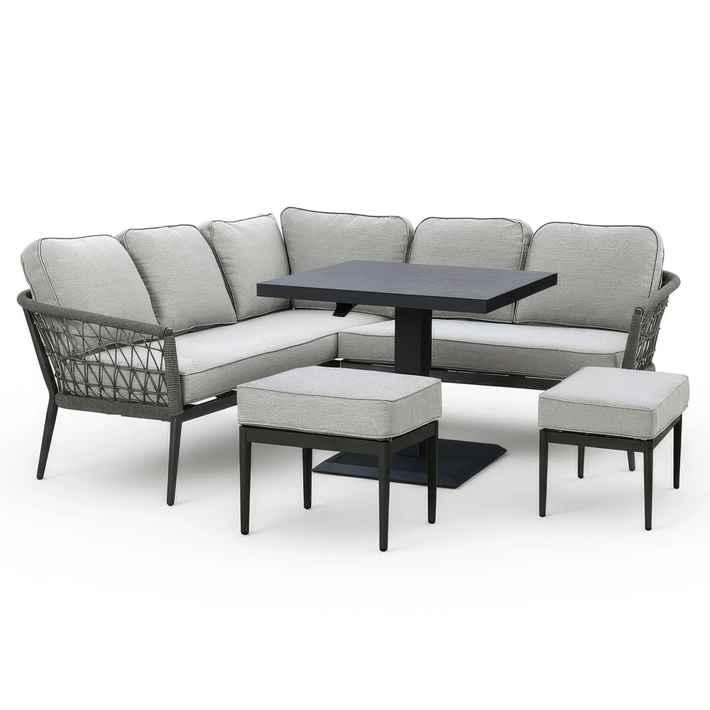 Corner garden sofa set with grey cushions, rectangular dining table and two stools
