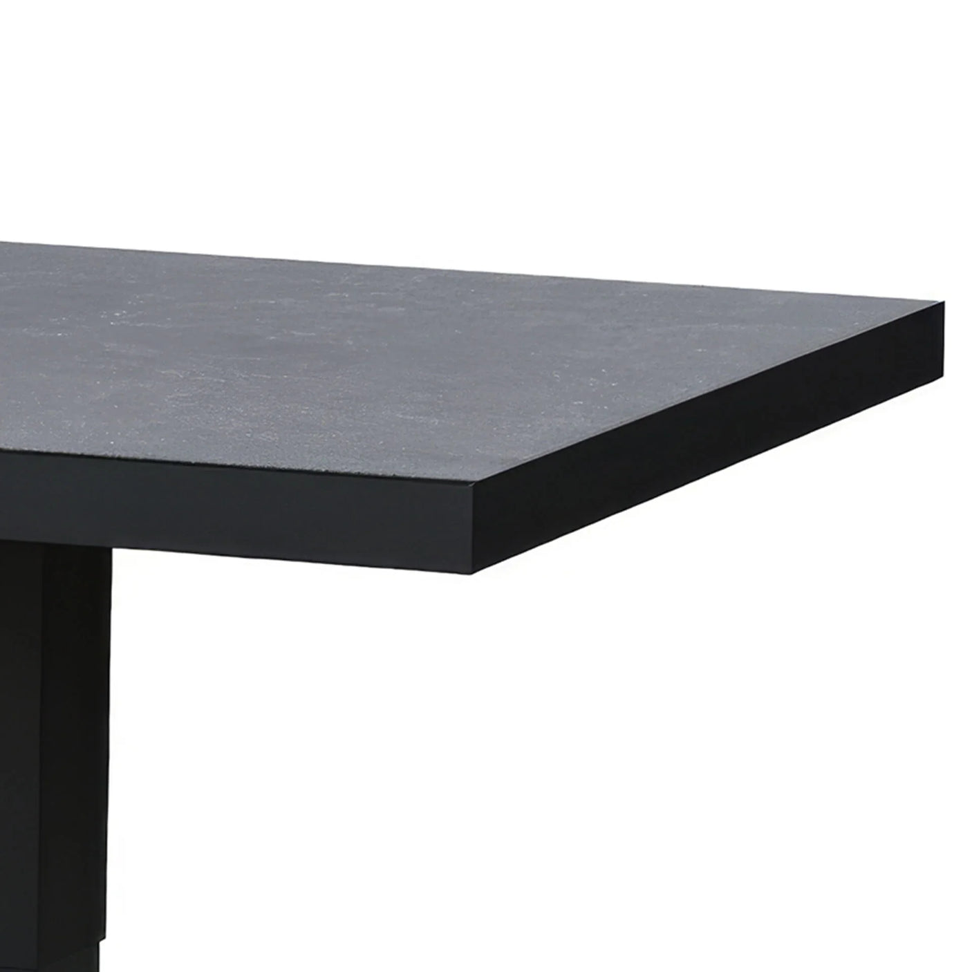 Closeup of black dining table top with matte finish and modern straight edge