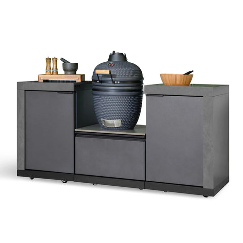 Outdoor kitchen island with ceramic charcoal grill, side cabinets, and wooden accessories