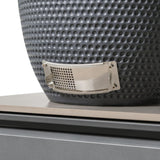 Textured charcoal ceramic fire pit grill base with stainless steel vent detail