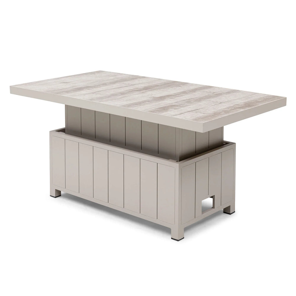 Rectangular lift top coffee table with light wood finish and panelled base, angled view