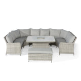 Grey rattan corner garden sofa set with cushions, matching table and bench seating