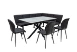 A 5-piece corner dining set featuring a rectangular white marble-patterned table with a black metal X-frame base, a black tufted corner banquette, and four matching black chairs with slim black legs, shown on a solid white background.