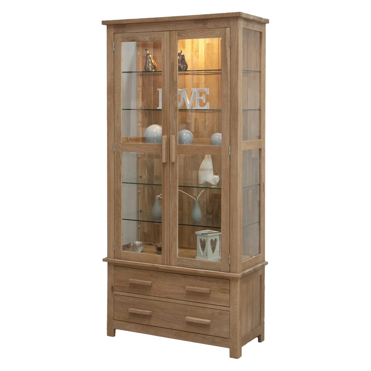 Oak display cabinet with glass doors, shelving and two drawers, decorated with ornaments