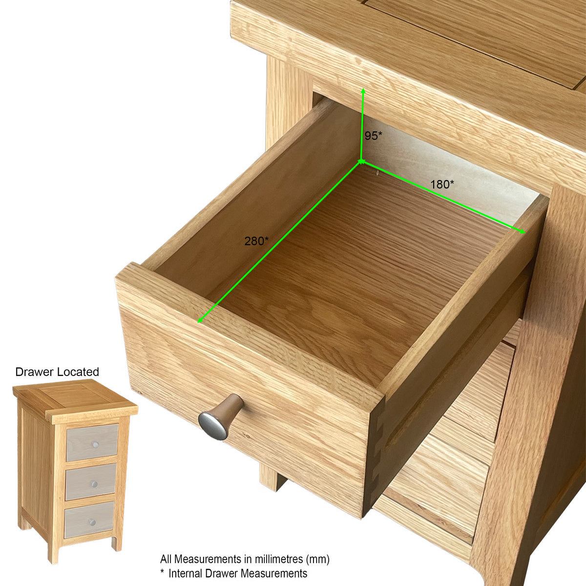 Oak bedside table with open drawer showing internal measurements in millimetres