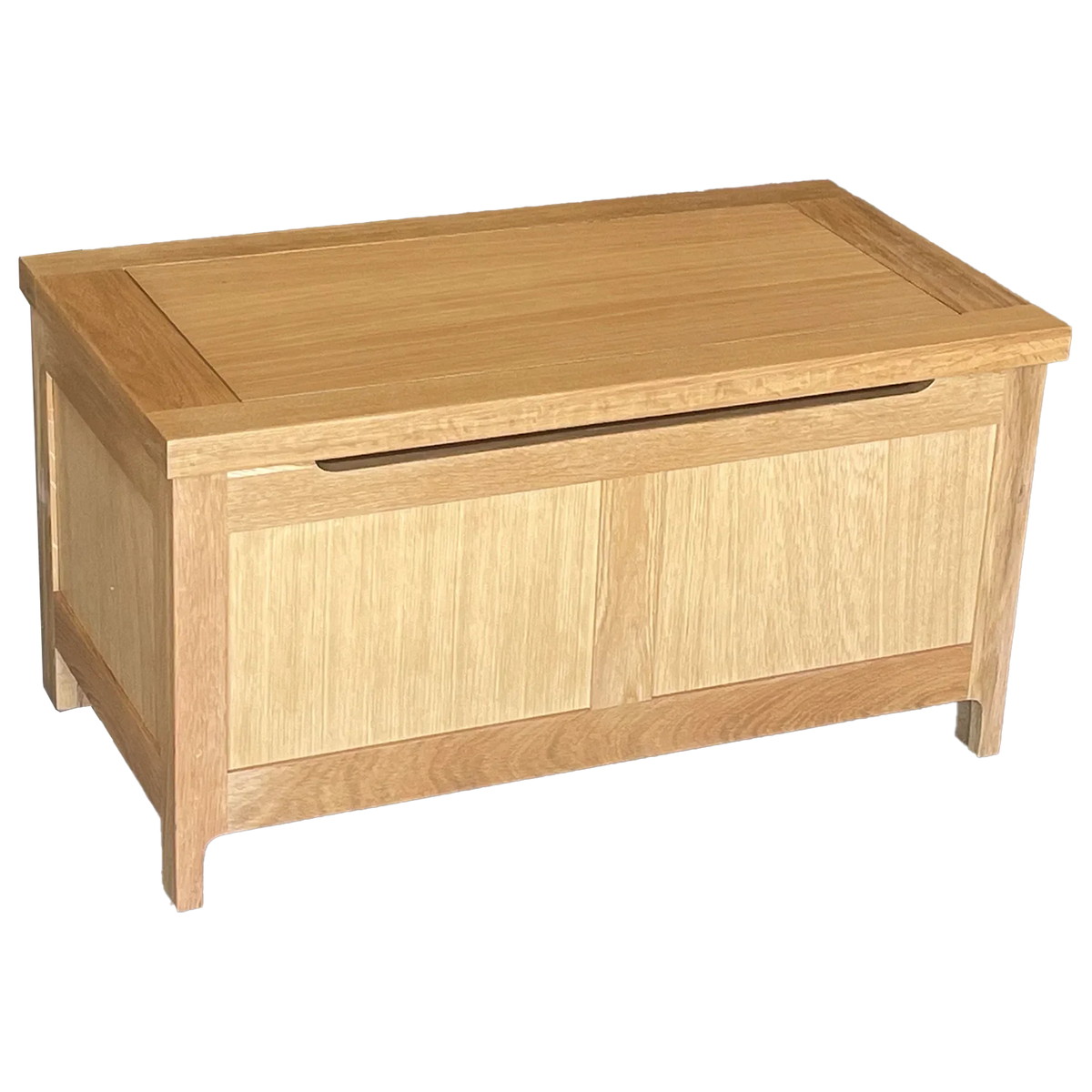 Oak storage chest with a hinged lid and panelled design on front and sides