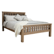 Oak wooden bed frame with slatted headboard and footboard, dressed with neutral bedding