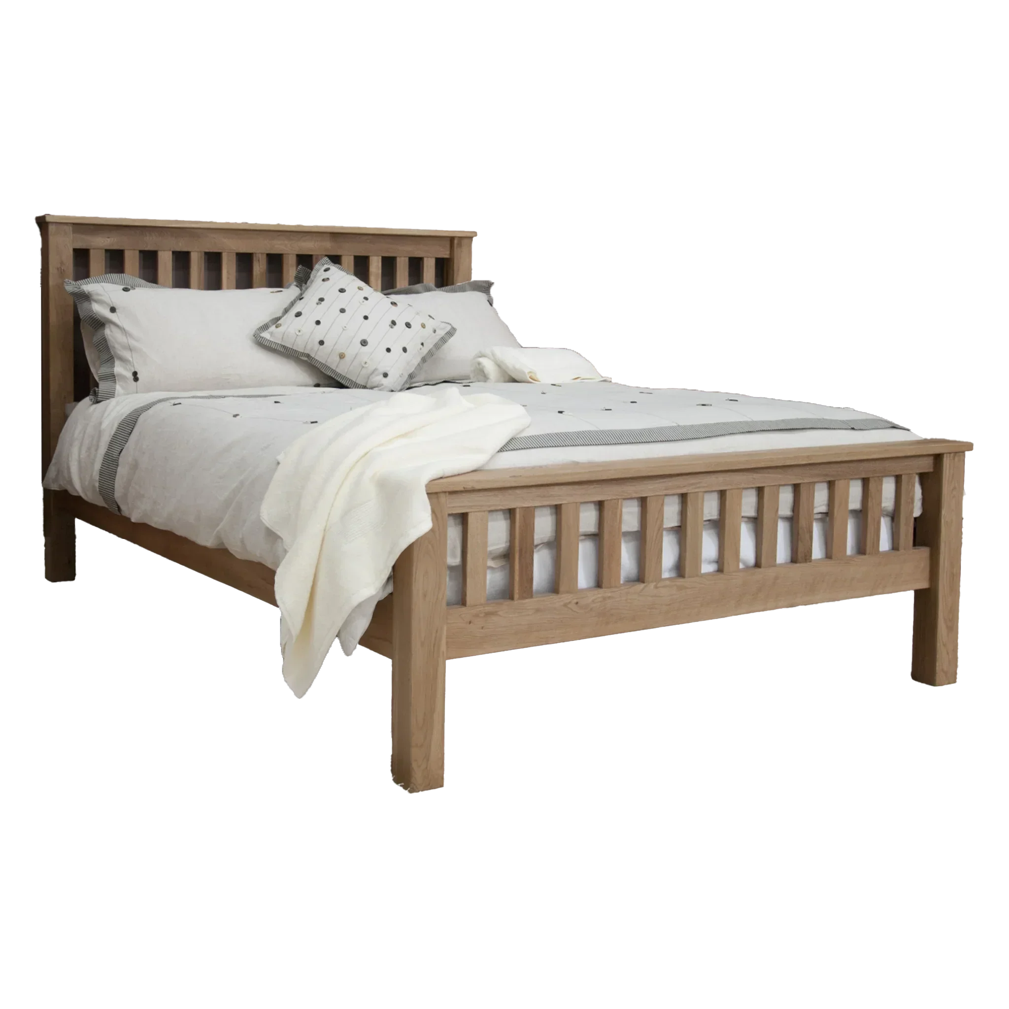 Oak wooden bed frame with slatted headboard and footboard, dressed with neutral bedding