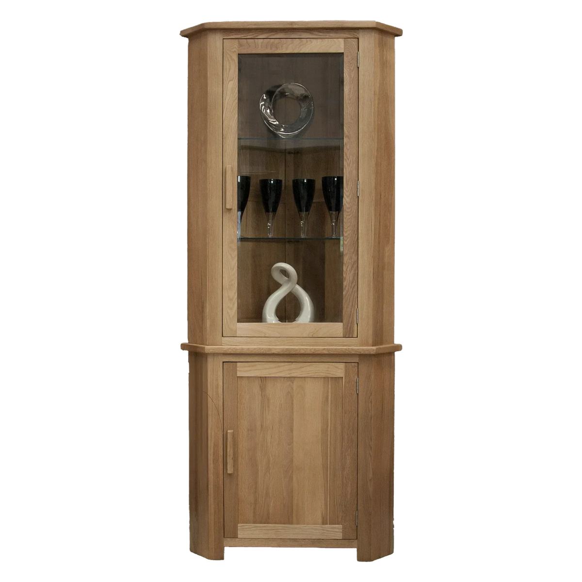 Oak corner display cabinet with glass door, wooden shelves, and decorative items inside