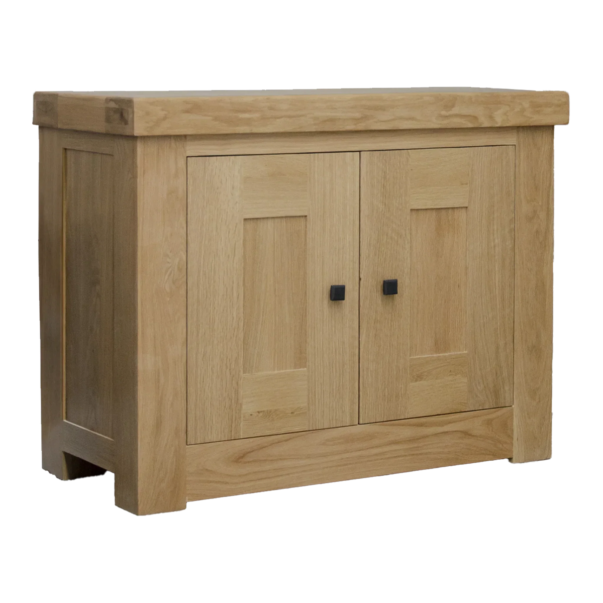 Oak sideboard with two panel doors and black square handles, shown at an angle