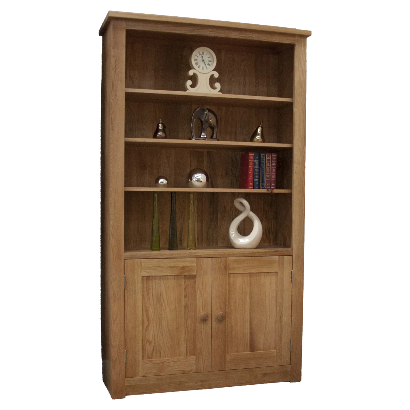 Oak bookcase with three shelves, lower cabinet doors, and decorative items displayed