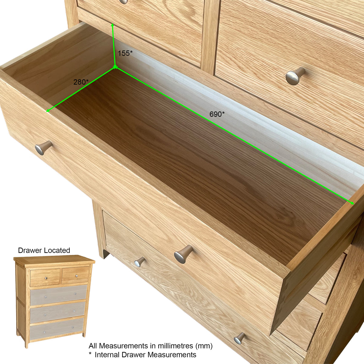 Oak chest of drawers open showing internal drawer measurements in millimetres