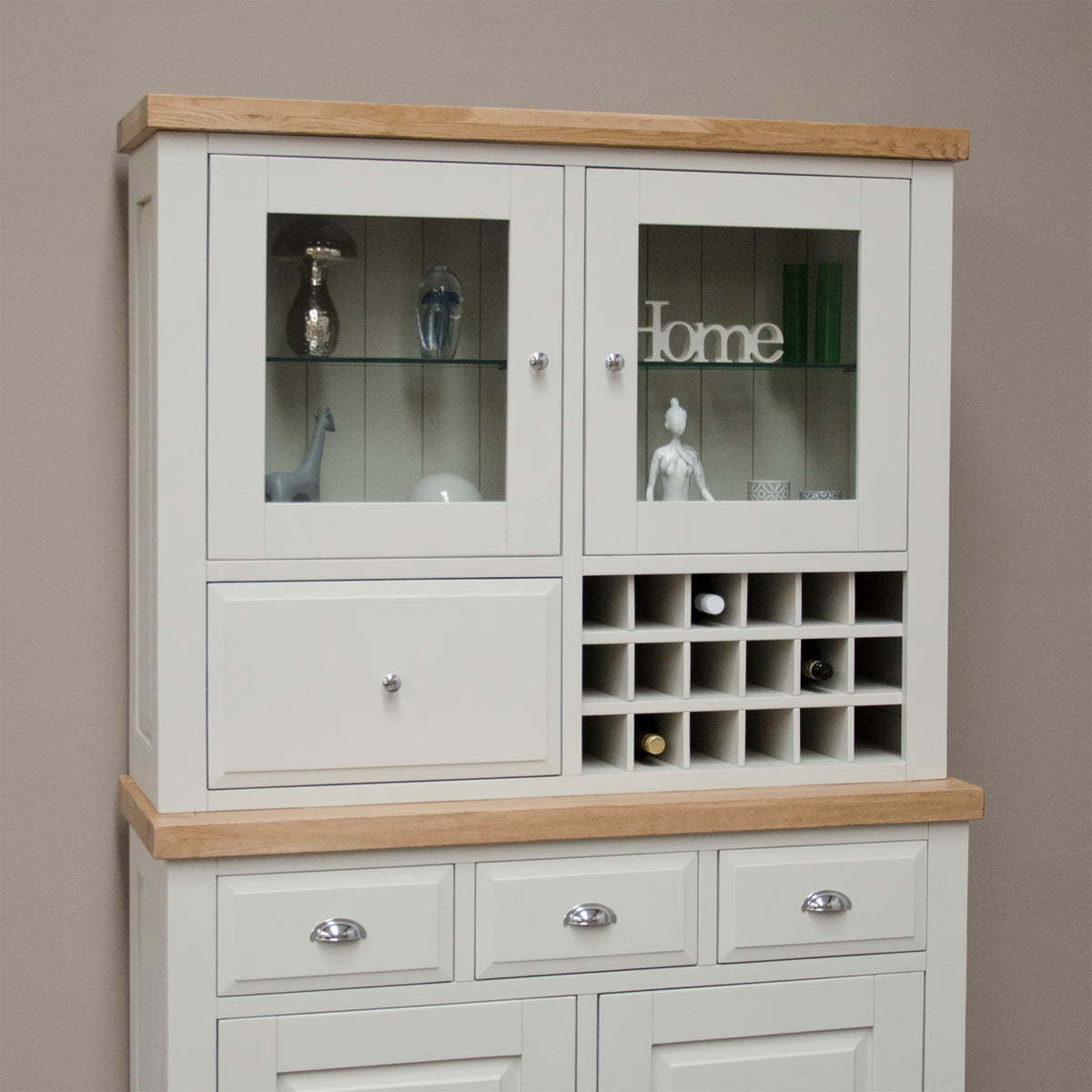 Cream wooden sideboard with oak top, glass cabinets and wine rack compartments