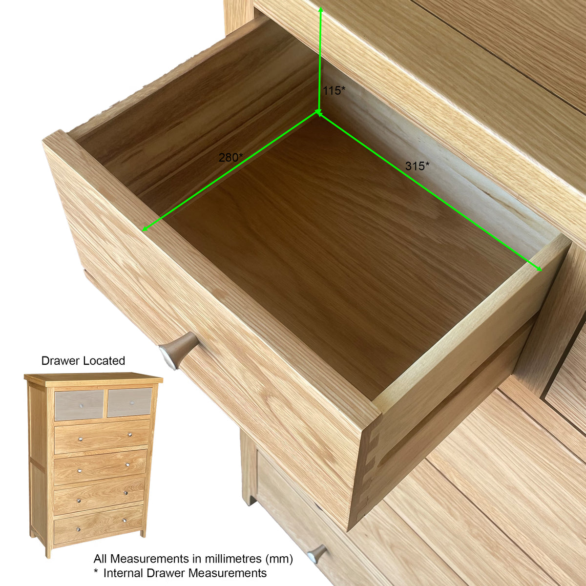 Oak chest of drawers with open drawer showing internal measurements in millimeters