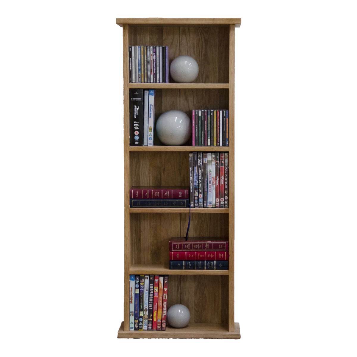 Tall oak bookcase with shelves holding books, DVDs, and decorative ornaments