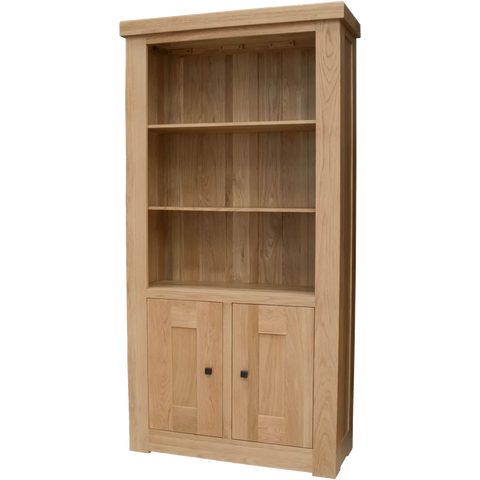 Oak bookcase with two shelves and storage cupboard, natural finish, front view