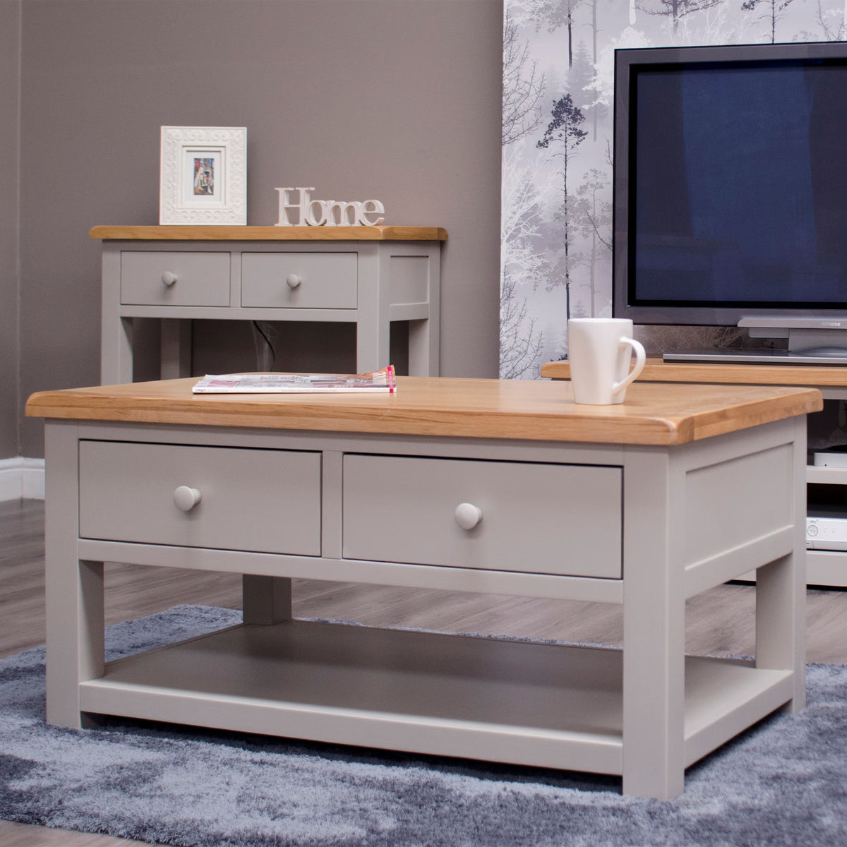 oak top coffee table with grey drawers and shelf in modern living room