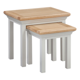 Oak and white painted nesting tables set with square tops and straight legs