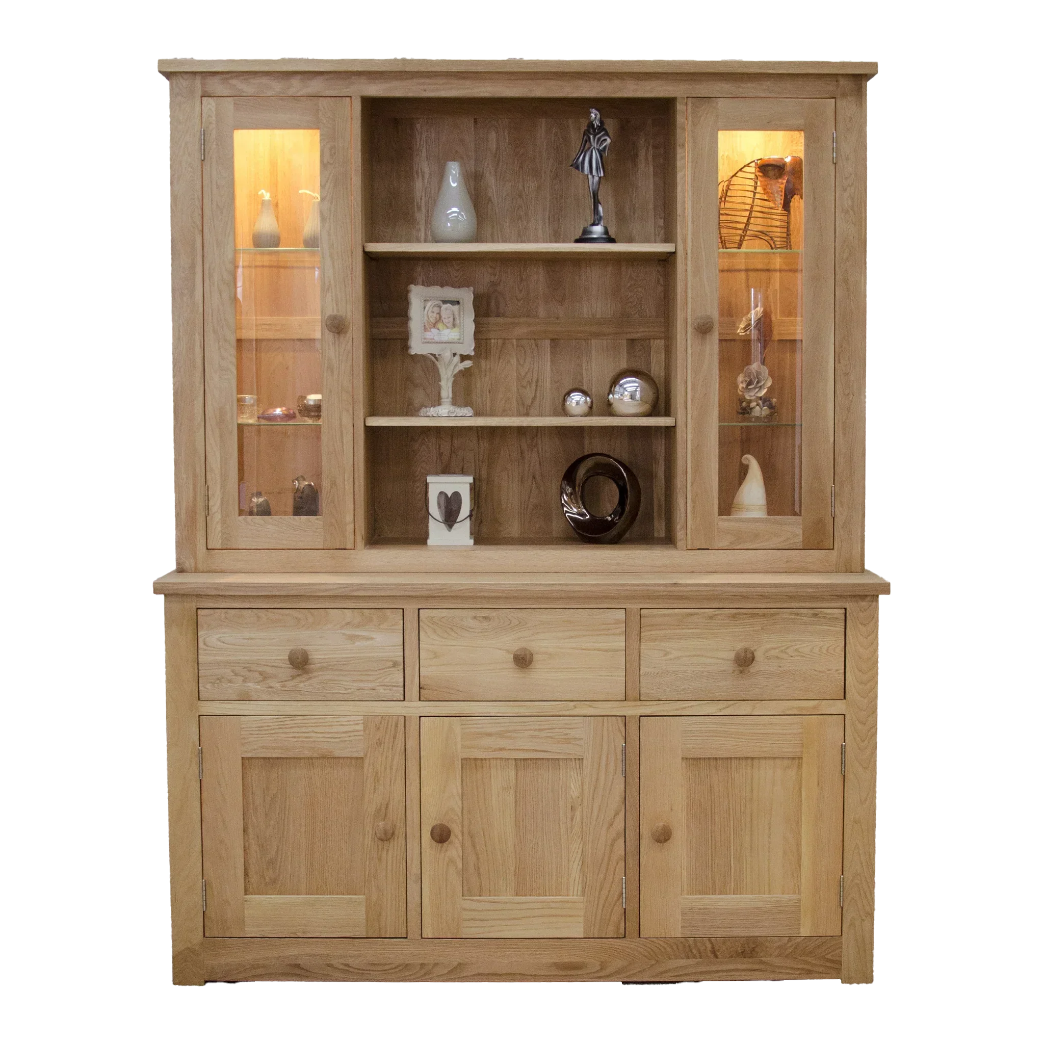 Oak display cabinet with glass doors, shelves, and lower storage drawers