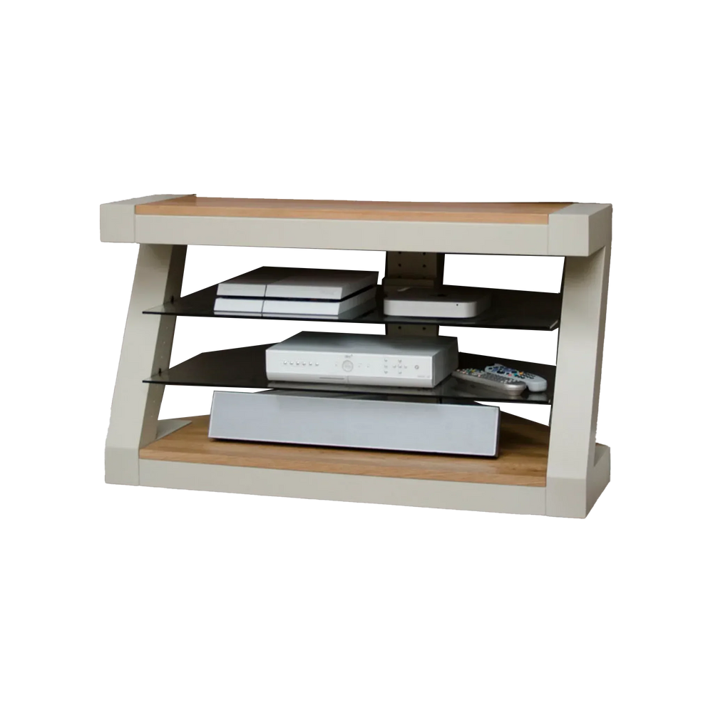 Modern TV stand with glass shelves and oak top, holding media devices and remotes