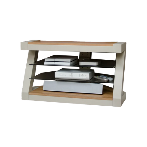 Modern TV stand with glass shelves and oak top, holding media devices and remotes