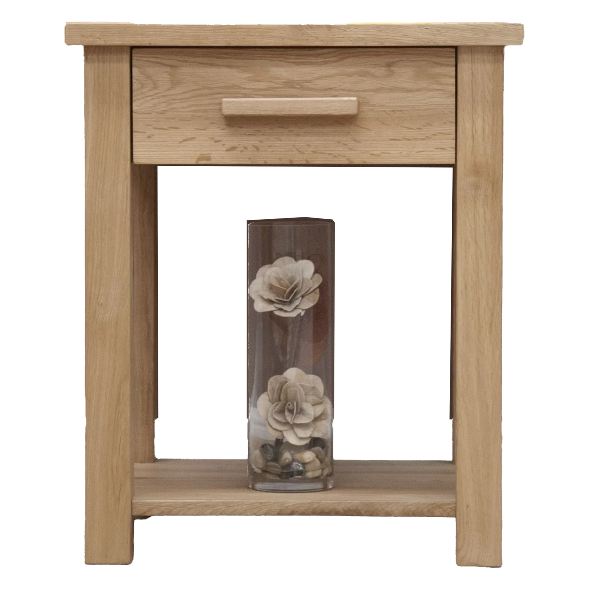 Oak bedside table with single drawer and lower shelf, clear vase with flowers displayed