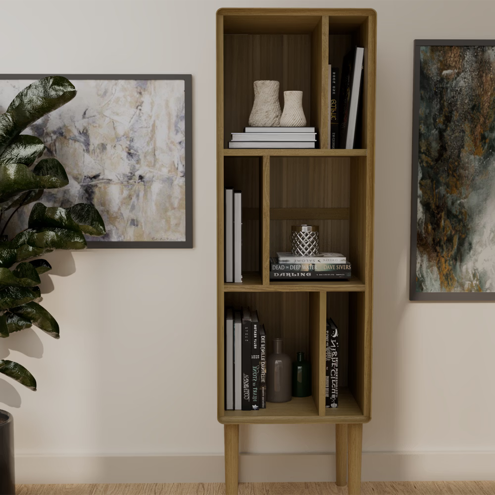 Tall wooden bookcase with open shelves styled with books, vases, and decorative items