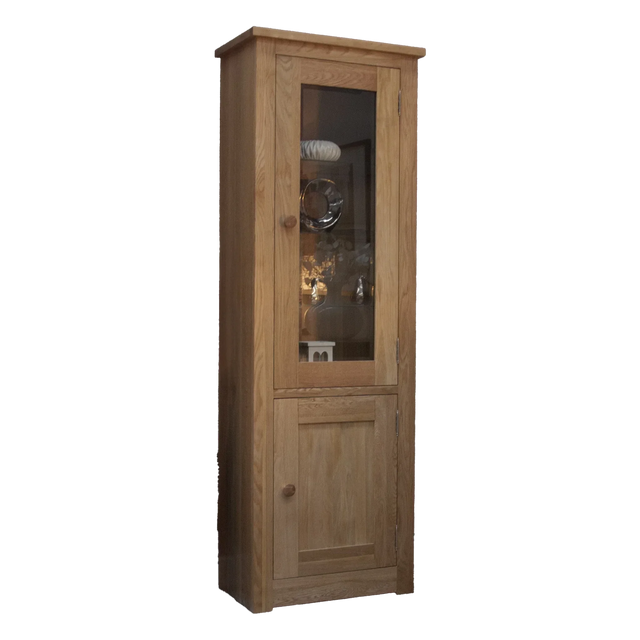 Tall oak display cabinet with glass door and wooden lower cupboard, shown at an angle