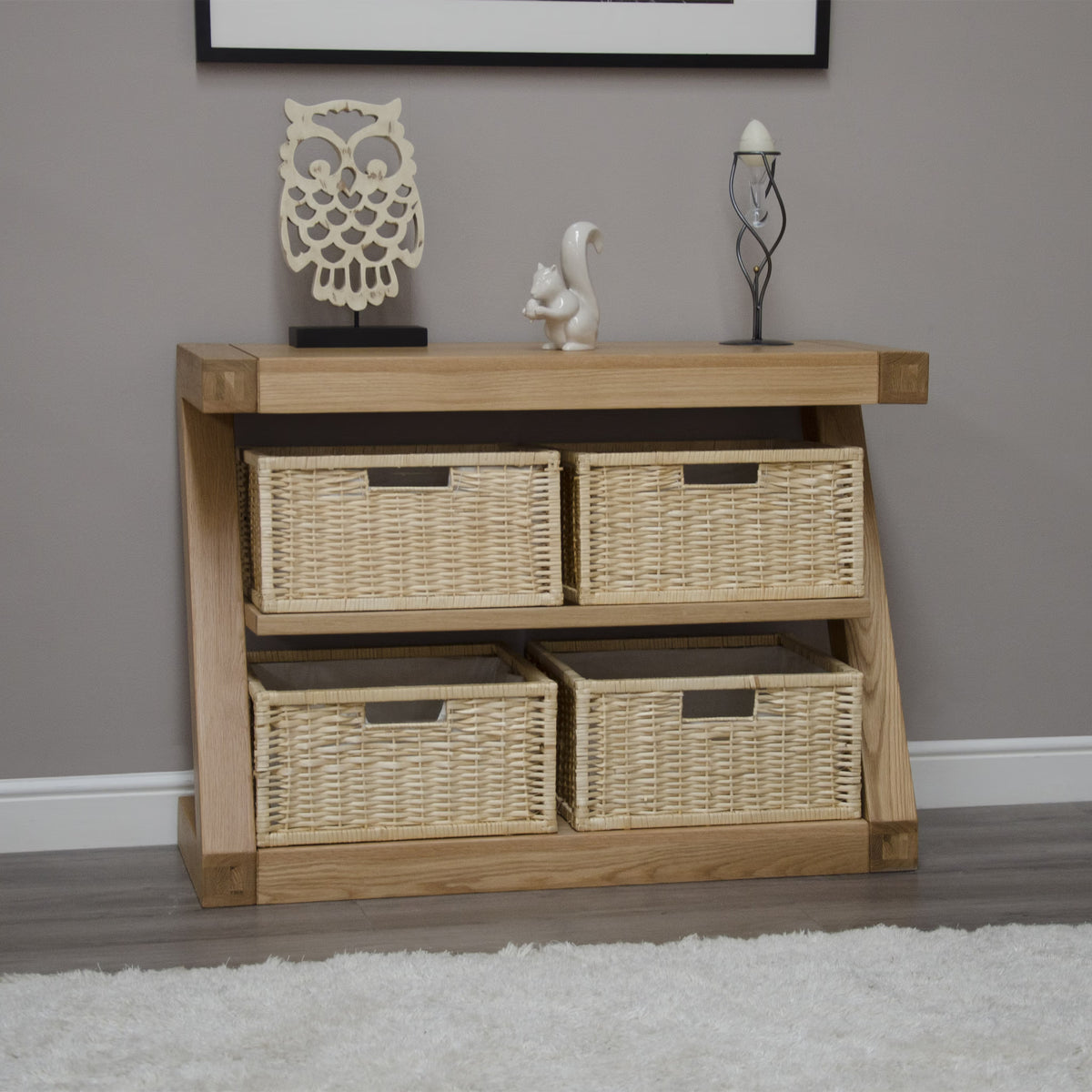 Oak console table with four wicker storage baskets in modern hallway setting