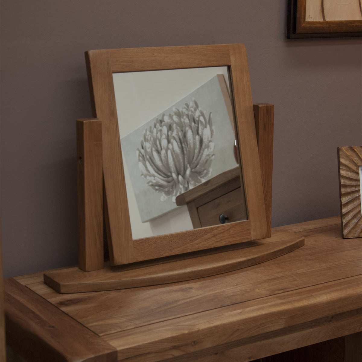 Oak dressing table mirror with wooden frame on matching oak table