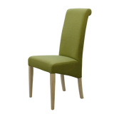 Green fabric dining chair with high back and light wood legs, side angle view