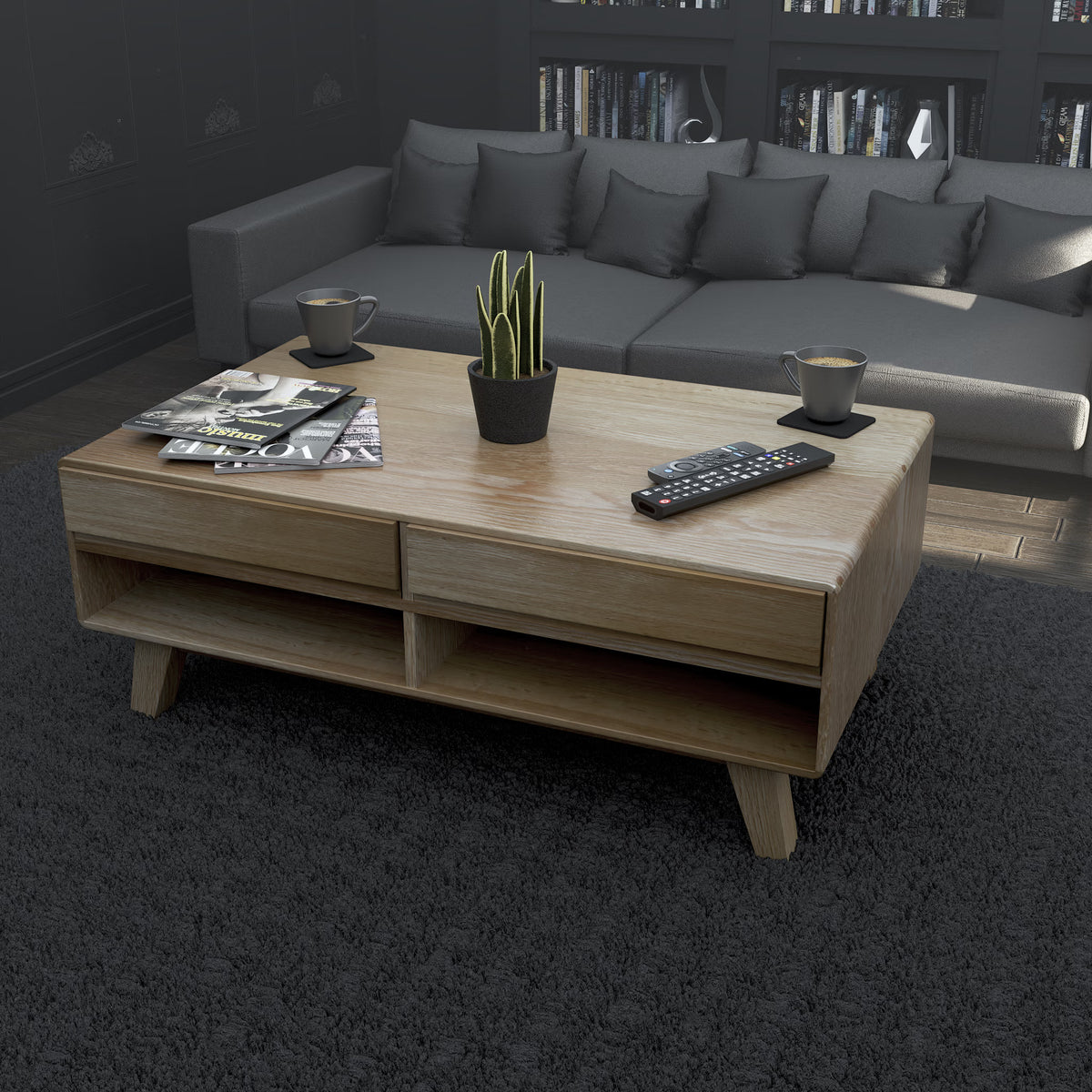 Oak coffee table with storage shelves in living room, magazines and plant on top