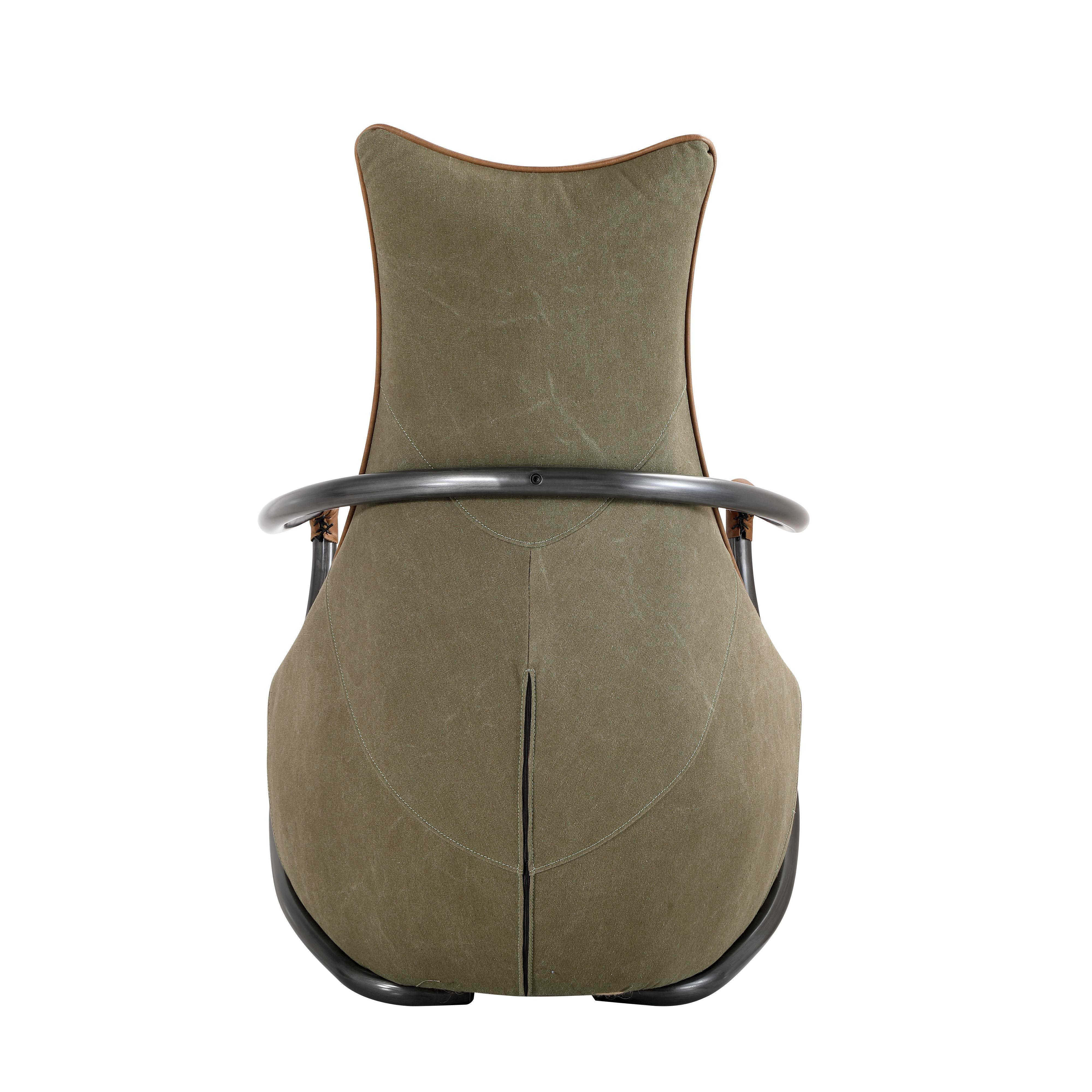 Olive green accent chair with black metal frame, rear angle view highlighting curved backrest