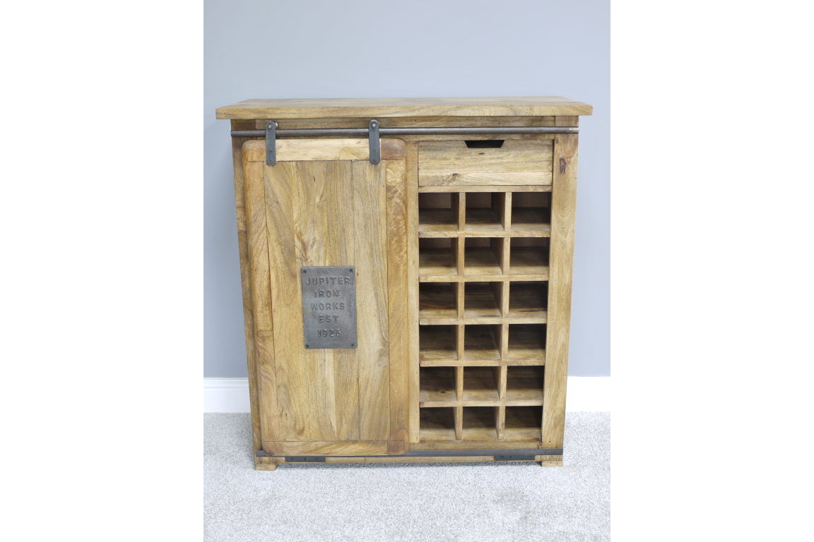The Jupiter Industrial Wine Cabinet features a rustic wooden design with a sliding door, a small drawer, and space for storing multiple wine bottles