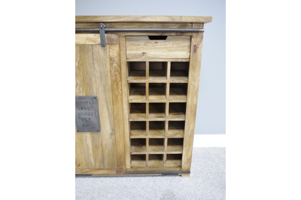 The Jupiter Industrial Wine Cabinet features a rustic wooden design with a metal accent, a drawer for storage, and a wine rack that holds multiple bottles
