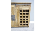 The Jupiter Industrial Wine Cabinet features a rustic wooden design with a metal accent, a drawer for storage, and a wine rack that holds multiple bottles