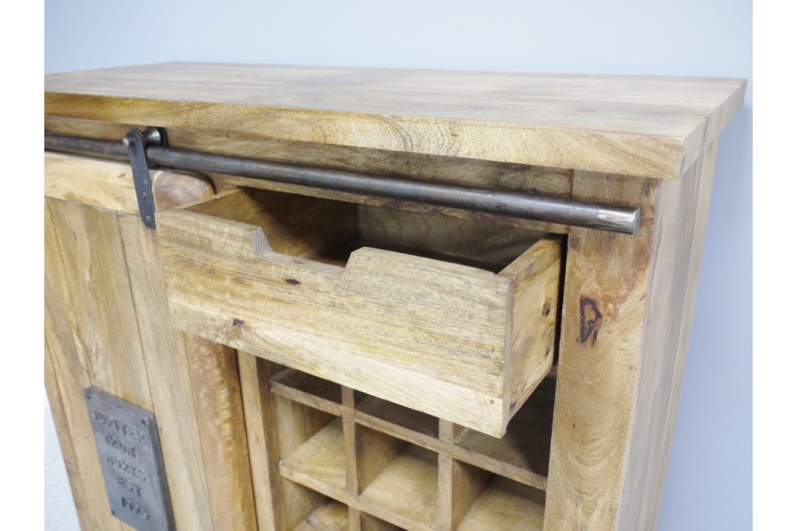 The Jupiter Industrial Wine Cabinet features a rustic wooden design with a sliding metal bar, an open drawer, and compartments for storing wine bottles