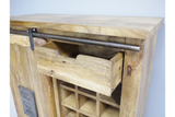 The Jupiter Industrial Wine Cabinet features a rustic wooden design with a sliding metal bar, an open drawer, and compartments for storing wine bottles