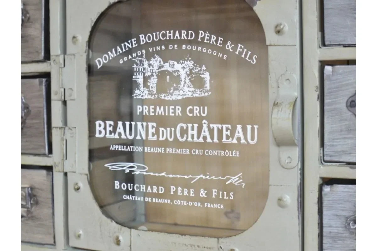 Vintage cabinet door with Beaune du Chateau wine label graphic and rustic metal frame