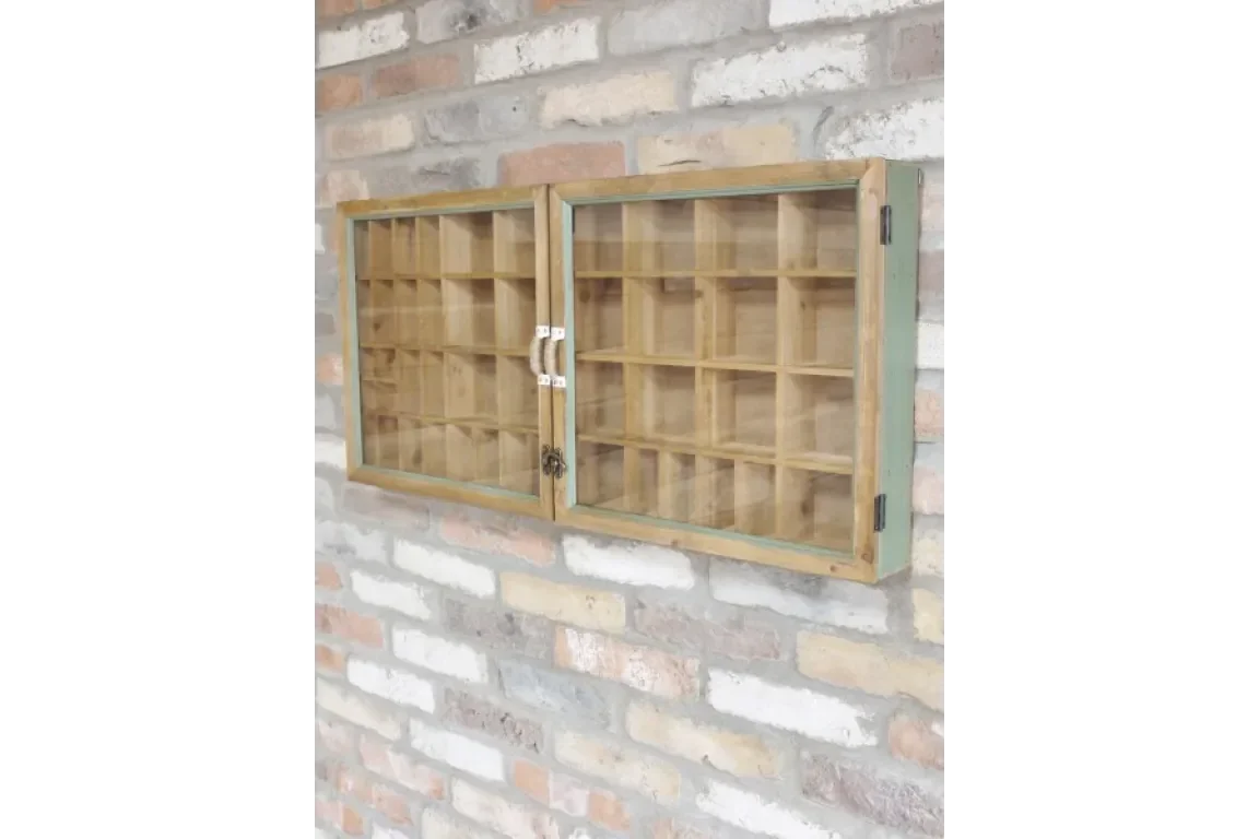 Wooden display cabinet with glass doors and multiple shelves mounted on a brick wall