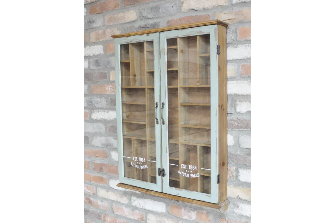 Wooden wall cabinet with glass doors and shelves, mounted on exposed brick wall