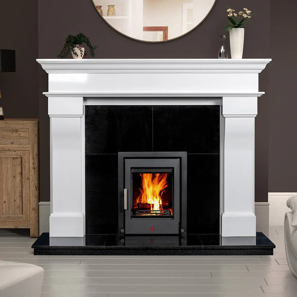 Bordeaux polished polar white fireplace surround with black hearth and wood burning stove