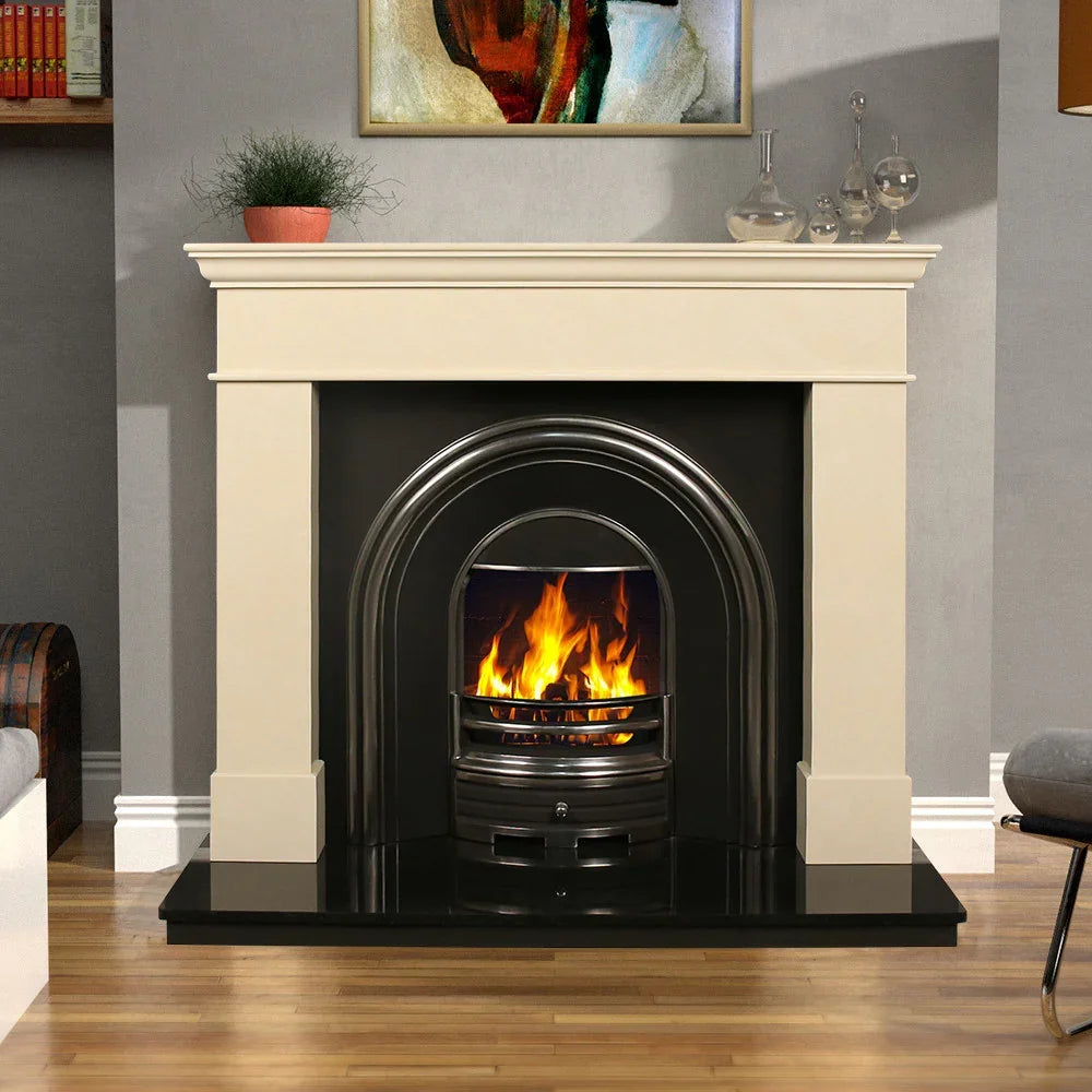 Ivory cream fireplace surround with black cast iron insert and real fire in modern living room