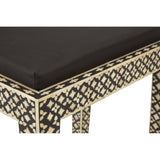 Boho black stool featuring a sleek black cushion and intricate mother of pearl inlay detailing along the edges and legs, showcasing a geometric pattern